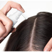 Application du Vichy Dercos Densi-Solutions Concentré Créateur de Masse 100 ml sur le cuir chevelu